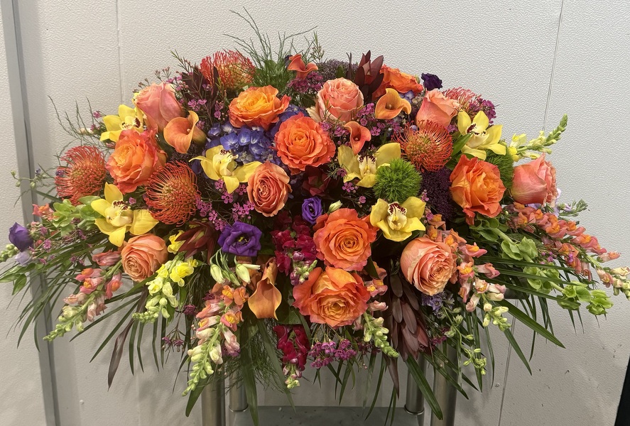 Racs Colorful Reflections Casket Spray from Racanello Florist in Stamford, CT